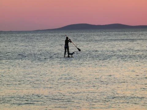 Stand-up Paddling at Twilight Foto stock