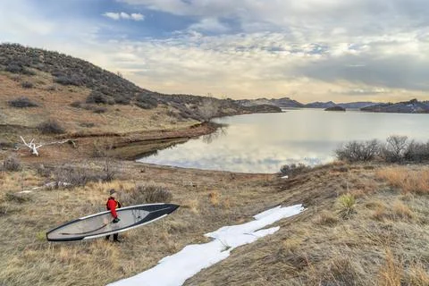 Stand up paddling winter training Stock Photos