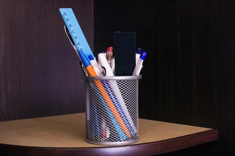 Stand with pens on the table shelf Stock Photos