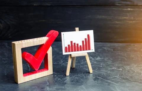 Stand with a red graph and a check mark. Voting, high rating. The concept o.. Stock Photos