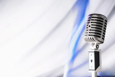 Stand with a retro microphone. Microphone on a tripod. Performance of the a.. Stock Photos