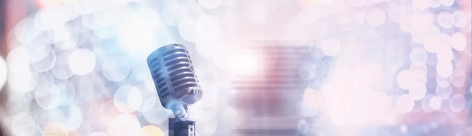 Stand with a retro microphone. Microphone on a tripod. Performance of the a.. Stock Photos