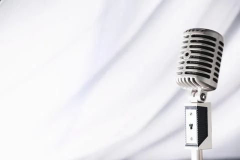 Stand with a retro microphone. Microphone on a tripod. Performance of the a.. Stock Photos