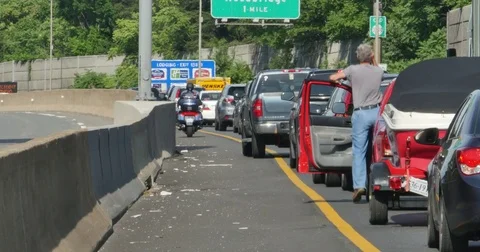 Stand Still Traffic Man Looking Through Binoculars at Car Accident Stock Footage 76948428