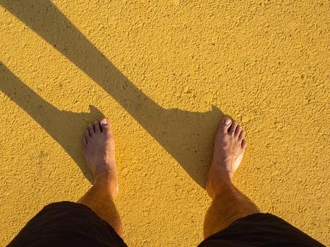 Stand on the yellow ground. Stock Photos
