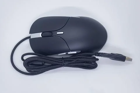 Standard Black Wired Computer Mouse with Silver Trim on Clean White Backgrou Stock Photos