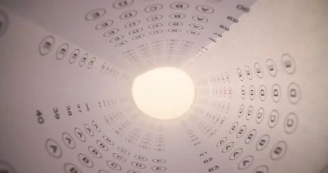 Standardized test in university uniform is folded into tube Stock Footage 239476950