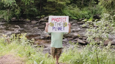Standing Alone Man Cares About Environment, Stands For Clean Water And Fresh Air Stock Footage 135763703
