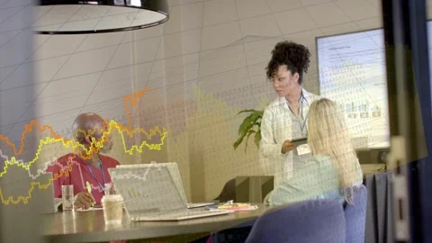 Standing analyst with tablet sharing tech data, making man look up as graphs Stock Footage 333463398