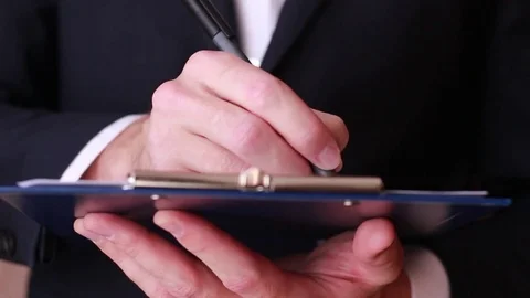 Standing and writing closeup Stock Footage 85167196