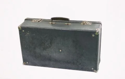 Standing at an angle leather old suitcase isolated on white background Stock Photos