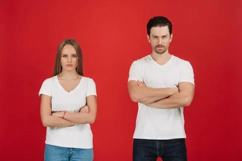 Standing apart from each other while being in a quarrel. Stock Photos