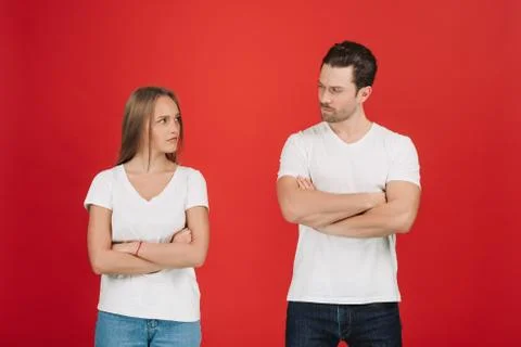 Standing apart from each other while being in a quarrel. Stock Photos
