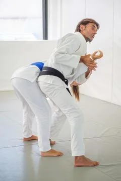 Standing armpit lock during a jiu jitsu demonstration Stock Photos