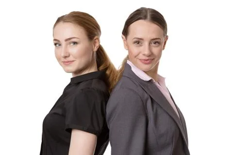 Standing backs together Stock Photos