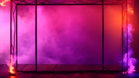 A standing black metal structure resembling a frame around colored smoke. Stock Footage 273954635