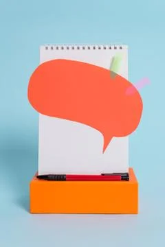 Standing blank spiral notepad speech bubble arrow banners rectangular box Stock Photos