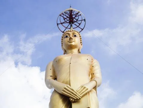 Standing buddha statue 写真素材