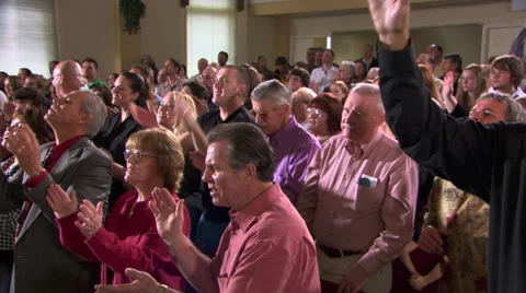 Standing congregation singing with uplifted hands Stock Footage 59532086