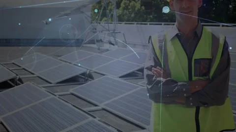 Standing with crossed arms, engineer over solar panels and network connections Stock Footage 328646995