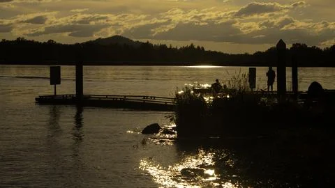 Standing on doc at dexter Stock Photos