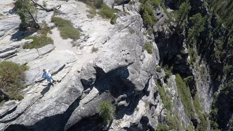 Standing on Edge of Cliff Stock Footage 87158099