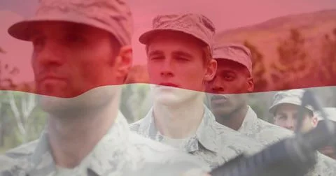 Standing five troops holding rifles on parade ground in camo shirts, patrol Stock Photos