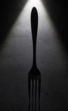 Standing fork in back light Foto stock