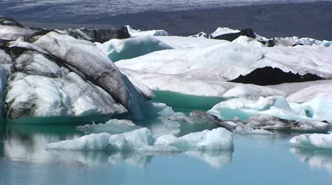 Standing iceberg of different colors on the lake Stock Footage 37898997