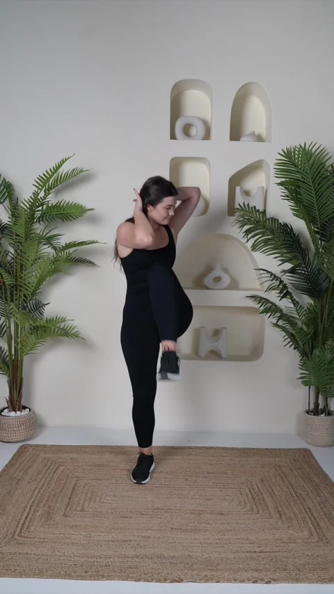 Standing Knee to Elbow Stock Footage 314187415