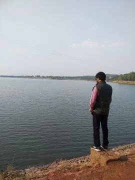 Standing on lake 写真素材