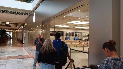 Standing in line in front of Apple Store Stock Footage 98819822