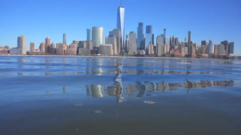 Standing Lower Manhattan skyscraper reflects on the Hudson River in New Jersey Video stock 336620988