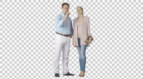 Standing man explains, points, talks to young female. Face. Green screen footage Stock Footage 50722226