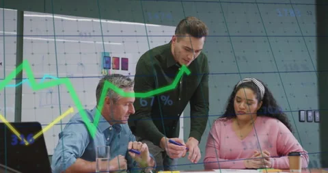 Standing man pointing at documents in business office, colleagues annotating Stock Footage 312229559