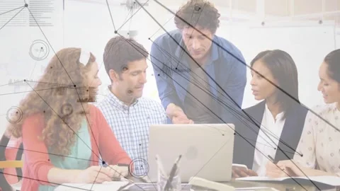 Standing man pointing at laptop, team reviewing tech project with network lines Stock Footage 331236027