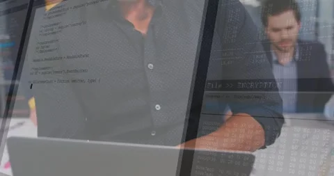 Standing man tapping laptop and causing soft code overlay while team reviewing Stock Footage 334034675