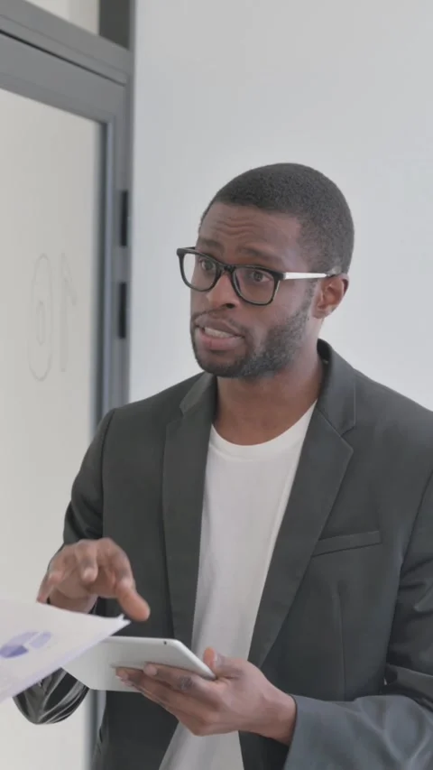 Standing Multi Ethnic Teammates Discussing Business Report, vertical video Stock Footage 324699076