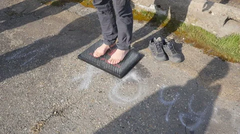 Standing on nails Stock Footage 68348884