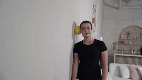 Standing Neck Isometrics Cervical Sidebending At Wall with Ball Stock Footage 314189691