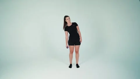 Standing Oblique Crunches Stock Footage 272917799