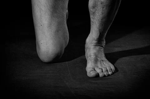 Standing on one knee. Stock Photos