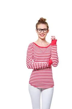 Standing out in stripes. Studio portrait of an attractive young woman in glasses Stock Photos
