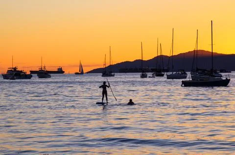 Standing paddling Stock Photos