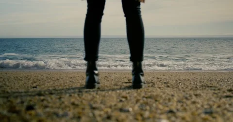 Standing On Pebble Beach Stock Footage 284743644