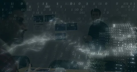 Standing presenter gesturing at wall, initiating binary overlay for design Stock Footage 330444095
