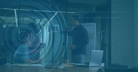 Standing professional in sweater explaining code on glass board in conference 스톡 사진