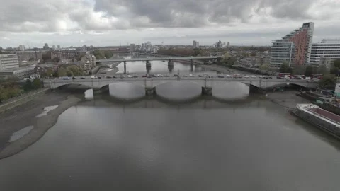 Standing queue of vehicles on historic Putney bridge over Thames river Stock Footage 167917631