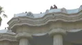 Standing on the rooftop of the building with columns in Park Guell, Barcelona 4k or 4k+ Resolution