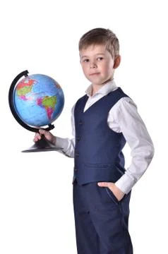 Standing schoolboy hold a globe of world in his hand Stock Photos